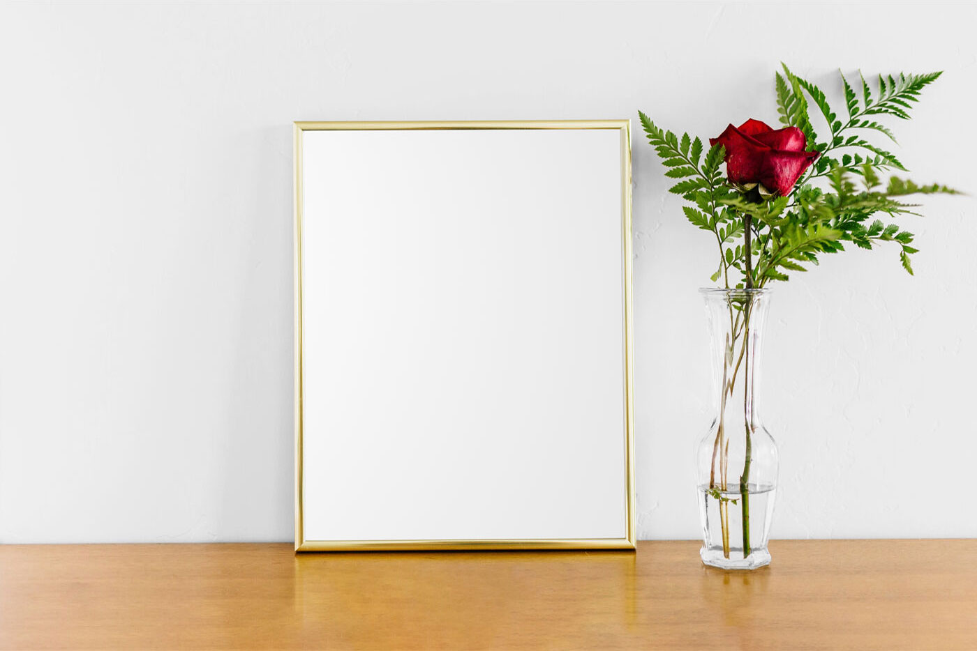 Poster With Gold Frame Mockup on Wooden Floor FREE PSD