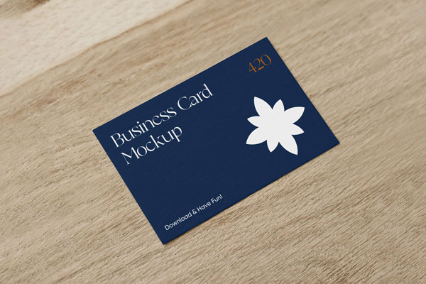 Realistic Business Card On A Wooden Surface Mockup FREE PSD