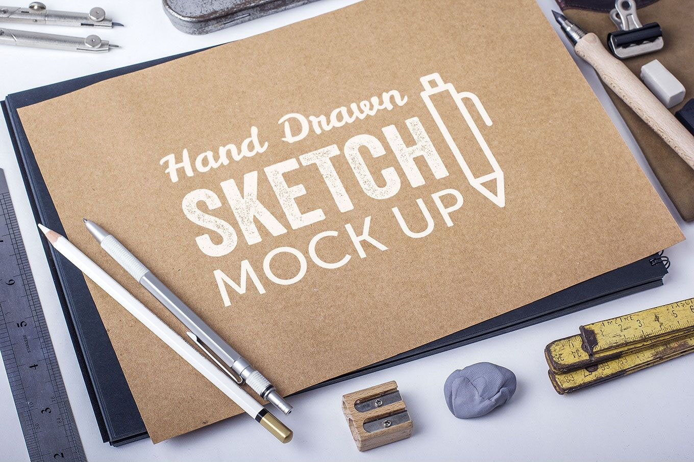 Free Hand Drawn Sketch Mockup with a Man Drawing – CreativeBooster