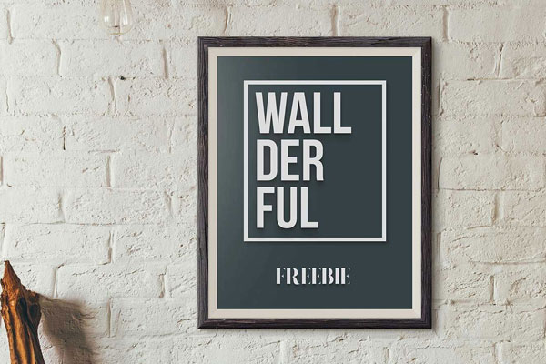 Wallderful Frame Mockups Hanging Above a Wooden Desk FREE PSD