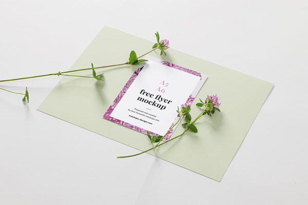 3/4 View of a A6 Flyer With Flowers on It Mockup FREE PSD