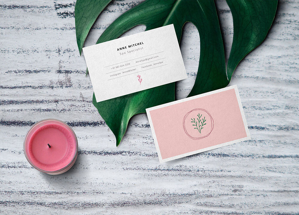 Business Card Mockup with Leaf and Candle in the Background FREE PSD