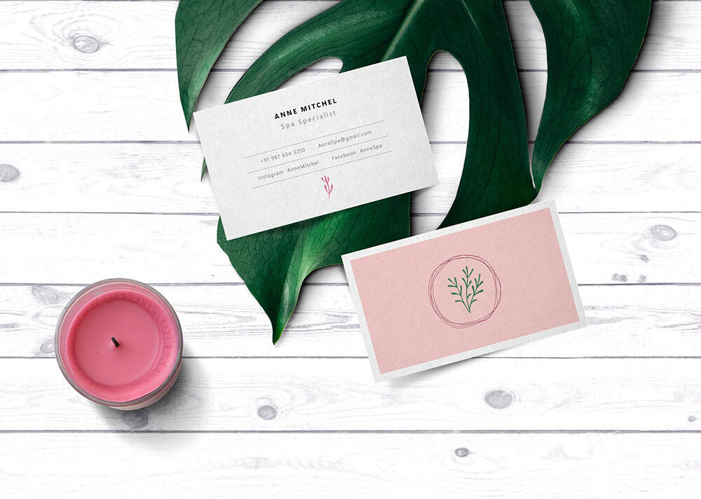 Business Card Mockup with Leaf and Candle in the Background FREE PSD