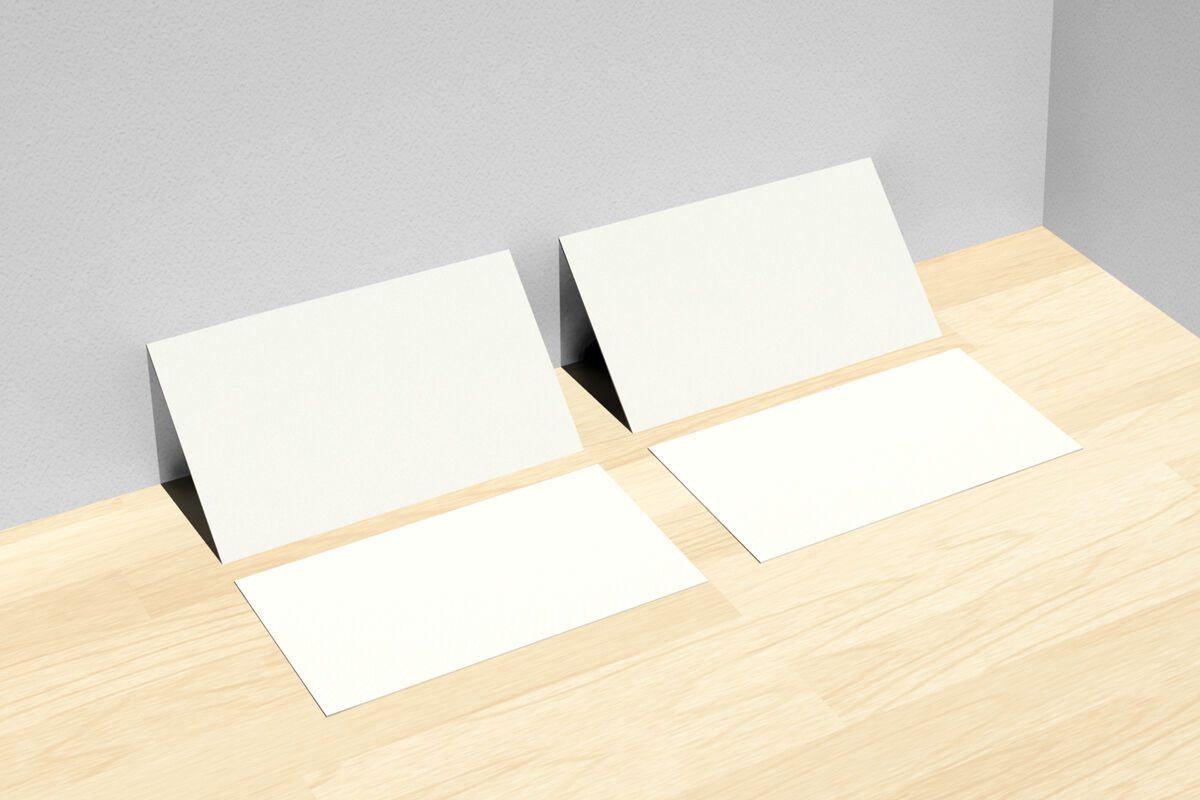 Four Business Cards in Corner on Wooden Floor Mockup FREE PSD