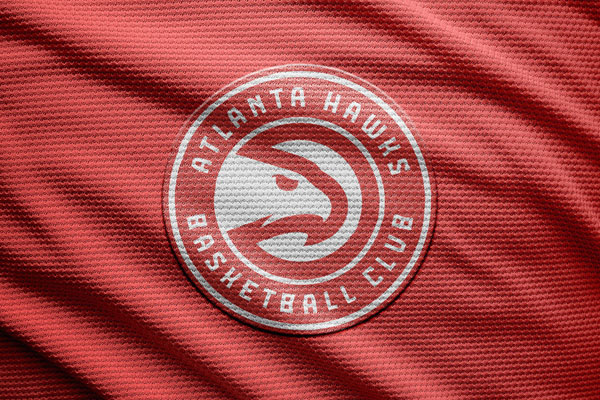 Four Mockups Showcasing Top View of Logo on Wrinkled Fabric FREE PSD