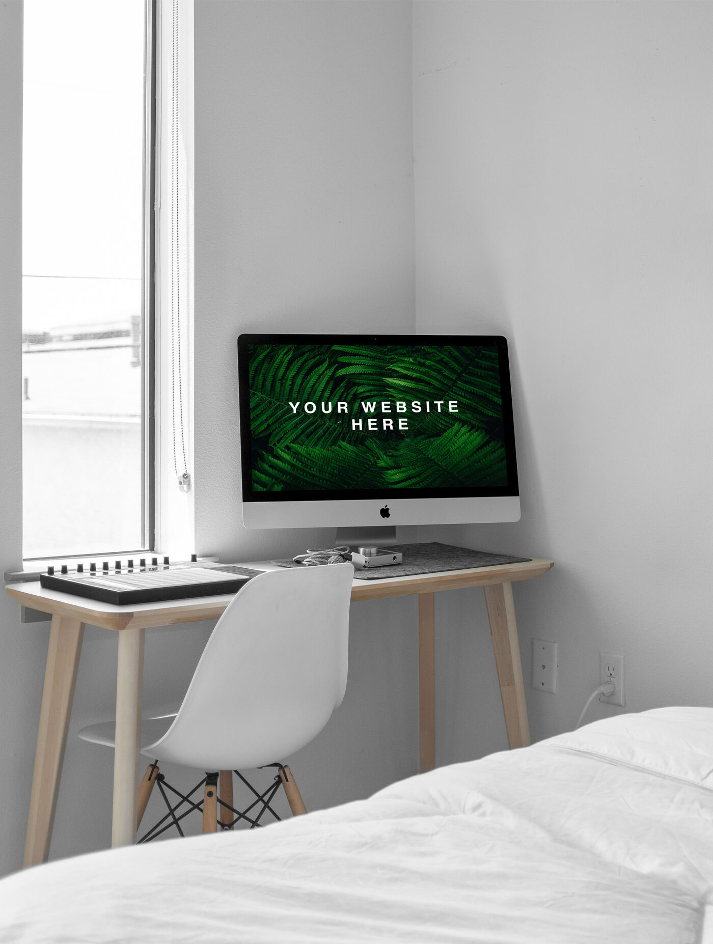 iMac on a Desk at the Corner of the Room Mockup FREE PSD