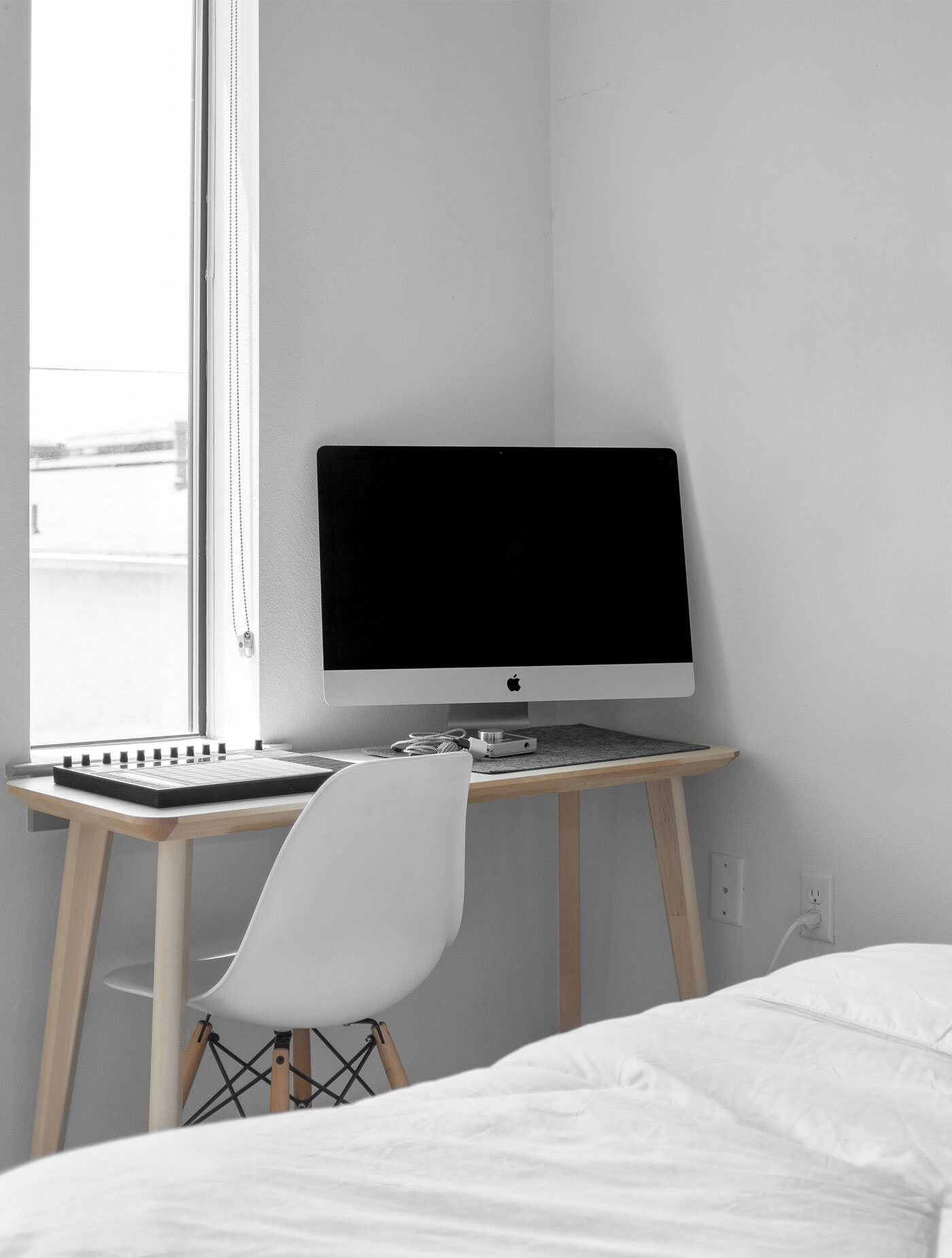 iMac on a Desk at the Corner of the Room Mockup FREE PSD