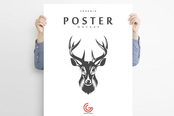Indoors Vertical Poster Mockup Featuring a Man Holding it in the Front View FREE PSD