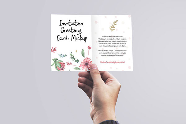 Invitation Greeting Card Grabbed by Hand Front View Mockup FREE PSD