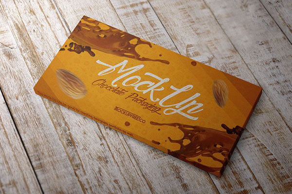 Mockup Displaying Chocolate Package on Wooden Surface FREE PSD