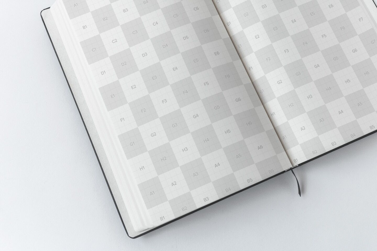 Mockup Displaying Opened A5 Hardcover Notebook with Sheet Separator FREE PSD