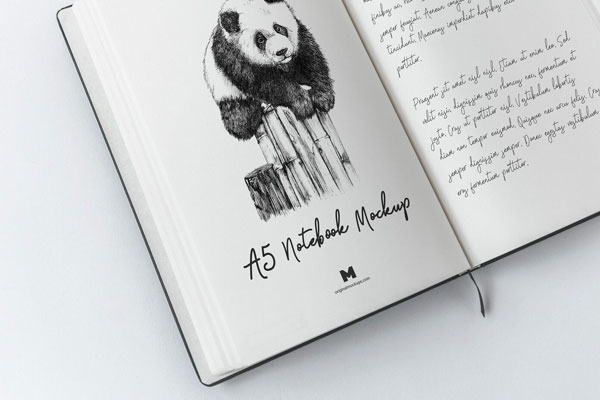 Mockup Displaying Opened A5 Hardcover Notebook with Sheet Separator FREE PSD