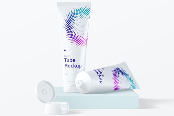 Mockup Displaying Standing and Laid Cosmetic Tubes FREE PSD