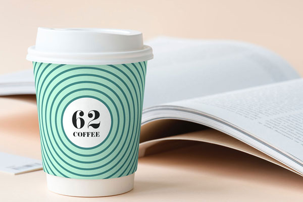 Mockup Featuring a Cup on a Desk FREE PSD