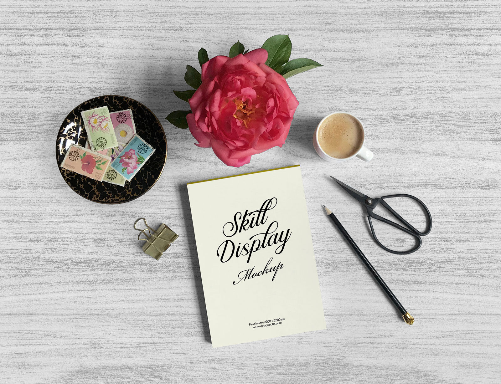 Mockup Featuring Overhead View of Drawing Pad, Stamps, Flower and Cup FREE PSD