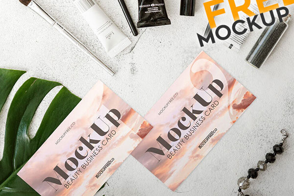 Mockup Featuring Two Business Cards in Beauty Products Setting FREE PSD