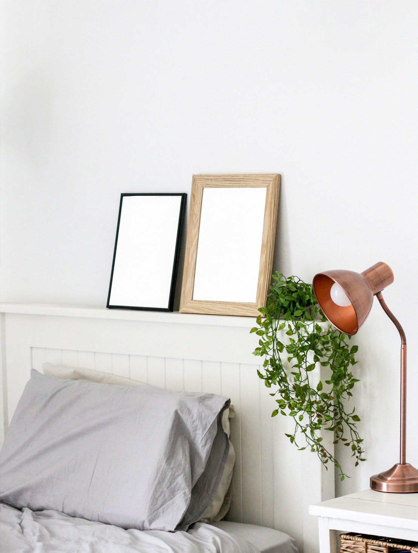 Mockup Featuring Two Frames against the Wall in Bedroom Setting FREE PSD