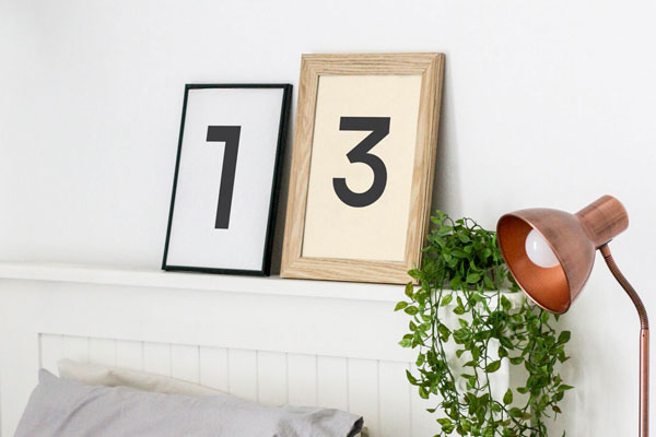 Mockup Featuring Two Frames against the Wall in Bedroom Setting FREE PSD