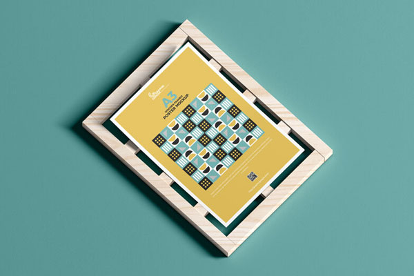 Mockup of an A3 Poster on Wooden Frame FREE PSD
