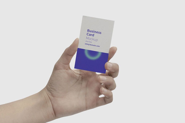 Mockup Showcasing a Hand Holding a Business Card FREE PSD