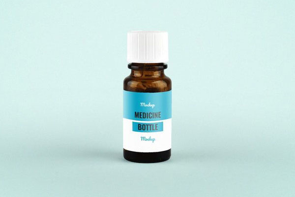 Mockup Showcasing Front View of Tiny Medicine Bottle FREE PSD