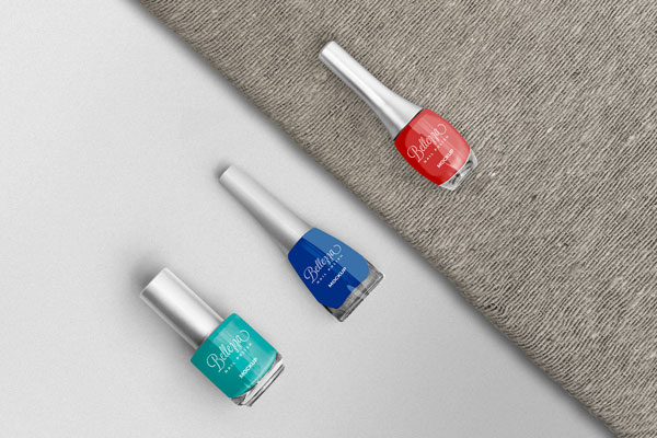 Overhead View of three Different Shape Nail Polishes Mockup FREE PSD
