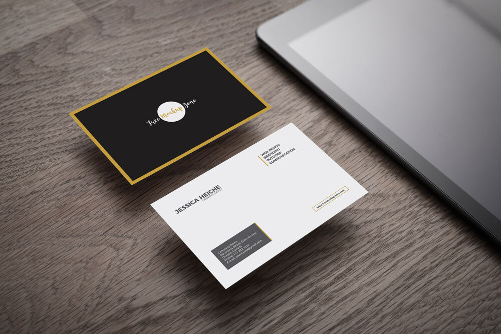 Perspective View Mockup Featuring Two Business Cards on Wooden Table FREE PSD