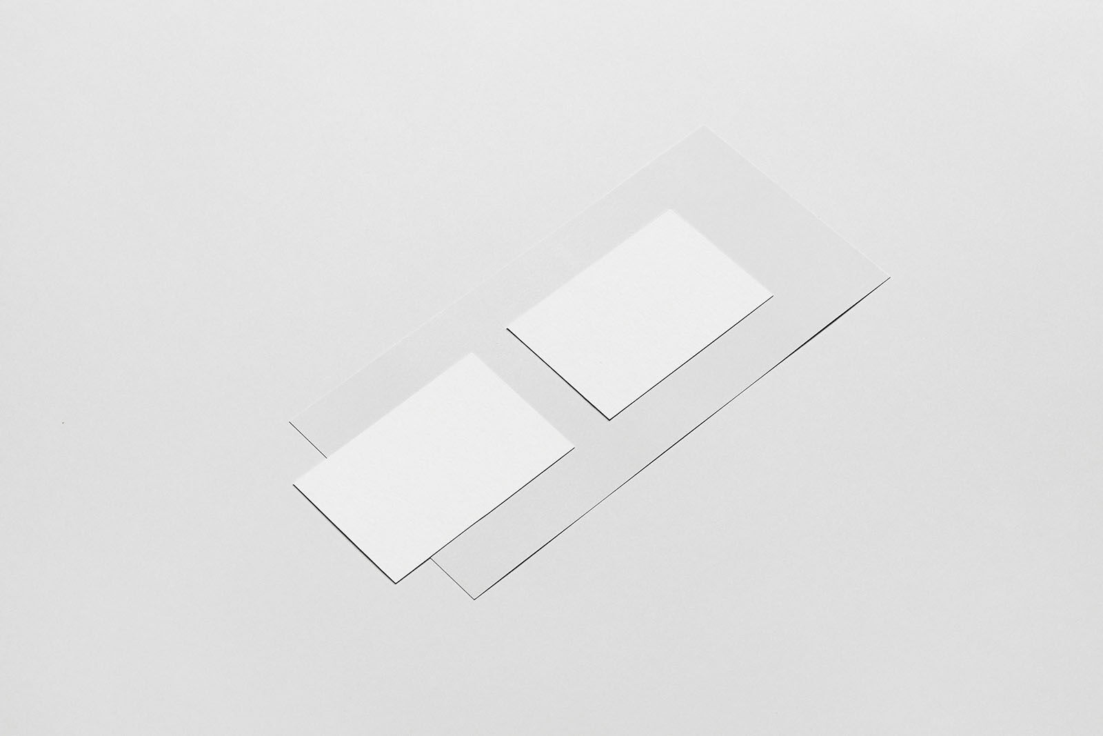 Perspective View of Two Business Cards On Paper Mockup FREE PSD