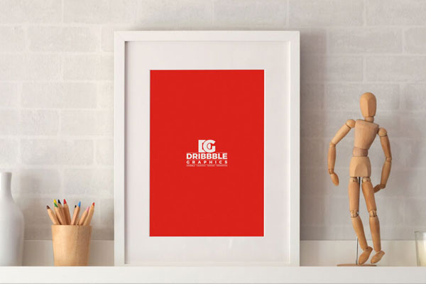 Photo Frame on a Shelf with Pencil and Statue around Mockup FREE PSD