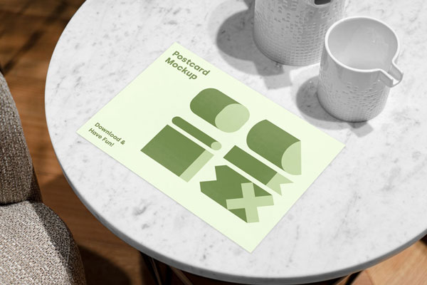 Postcard Mockup on Realistic Setting FREE PSD