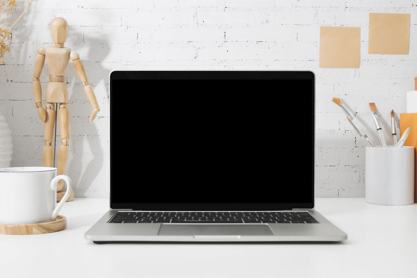 Retina MacBook Workspace Mockup with Real Life Objects FREE PSD