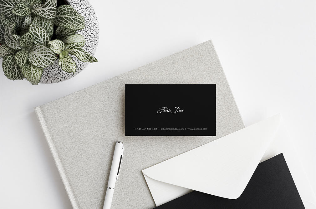 Three Mockups Showing Business Card in Different Overhead View Scenes FREE PSD