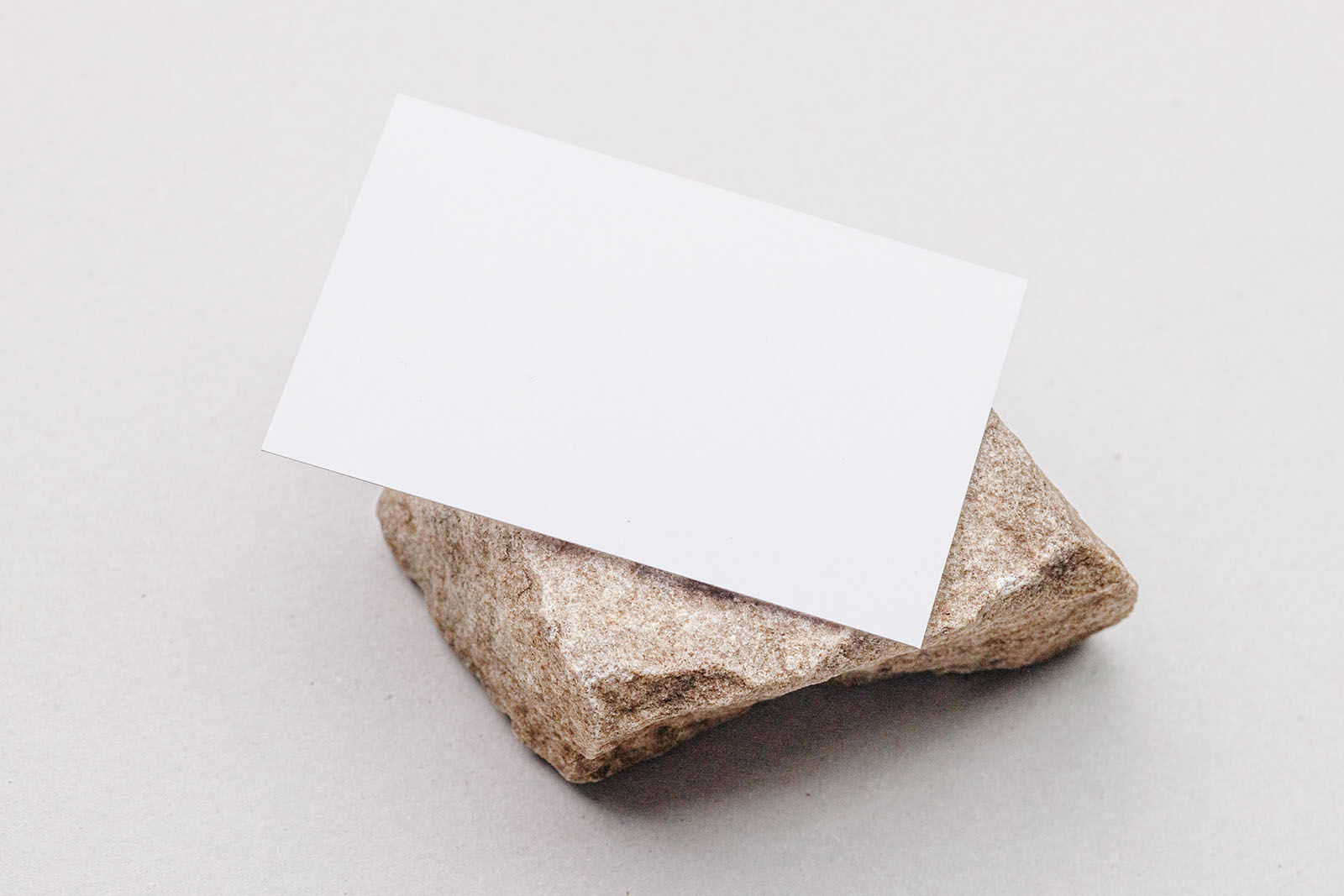Top Side View of Business Card Mockup on Stone FREE PSD