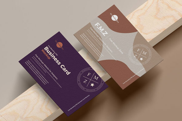 UK Size Business Card Mockup laying on a Wooden Piece FREE PSD