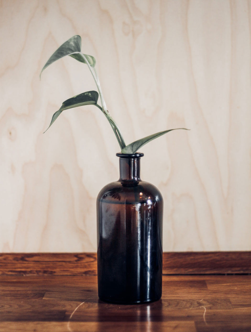 Vase Bottle Mockup on a Wooden Table FREE PSD