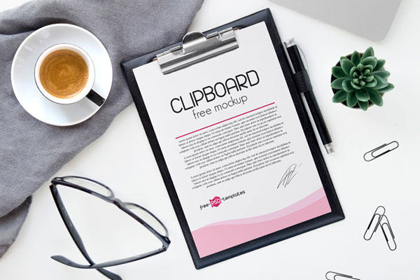 2 Clipboard Mockups with Pencil, Pins and a Cup of Coffee and Other Items FREE PSD