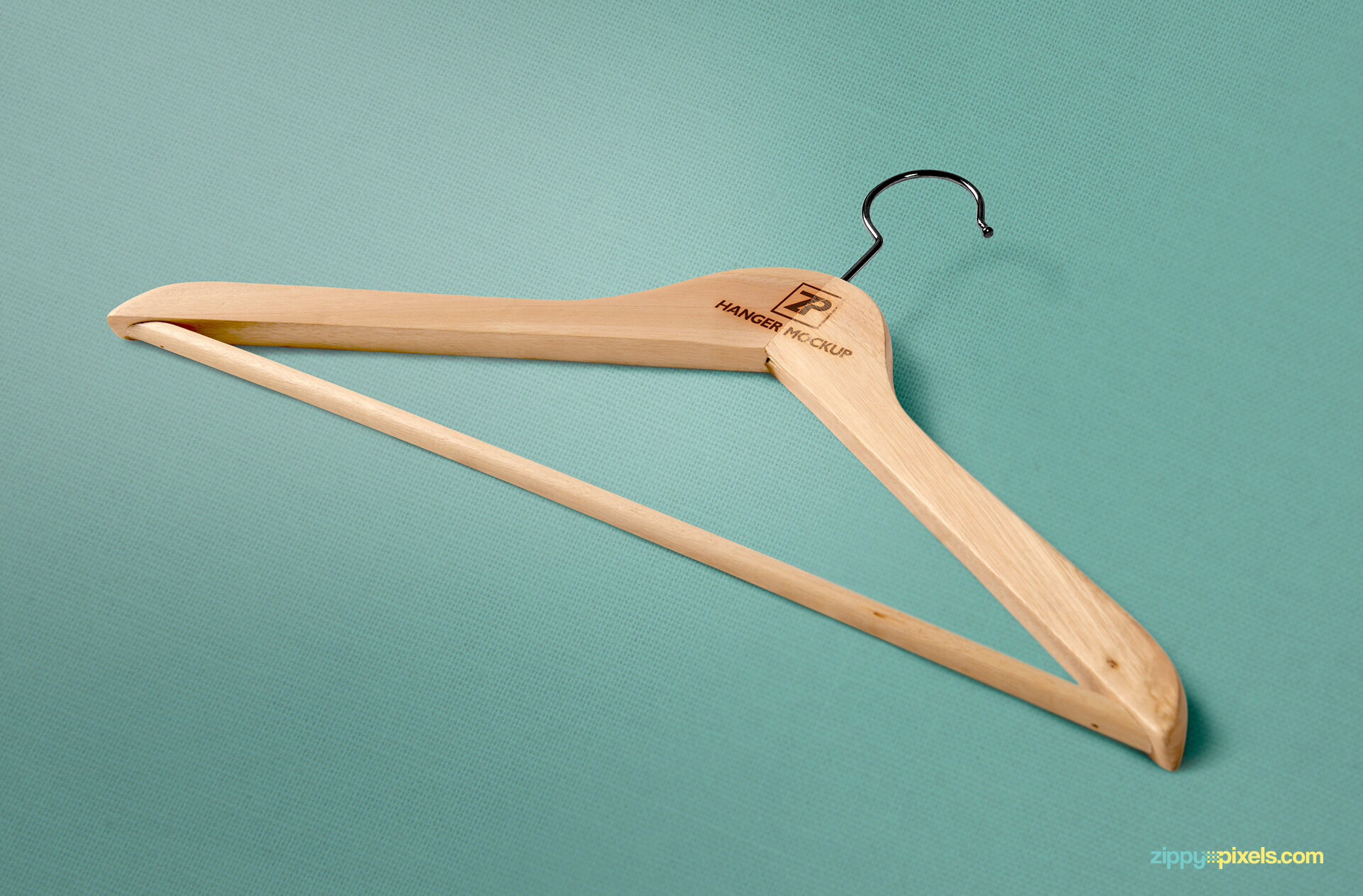 3 Mockups of Wooden Clothes Hangers FREE PSD