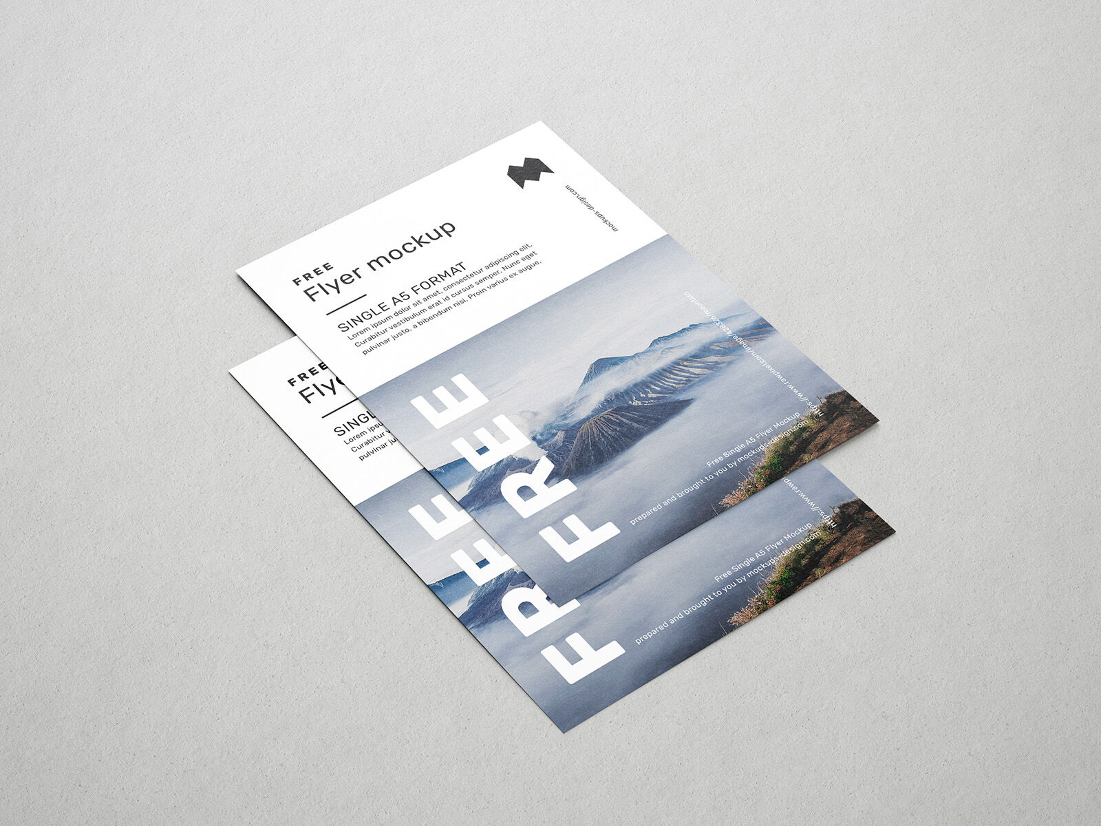 4 Mockups featuring A5 Flyers in Different Views FREE PSD