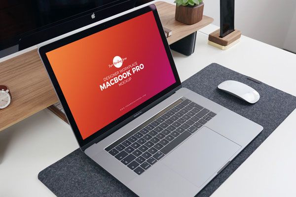 Designer Workplace MacBook Pro Mockup Featuring Lifelike Elements FREE PSD