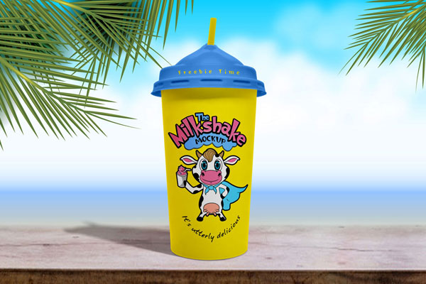 Front View of Disposable Milkshake Cup in Beach Setting Mockup FREE PSD