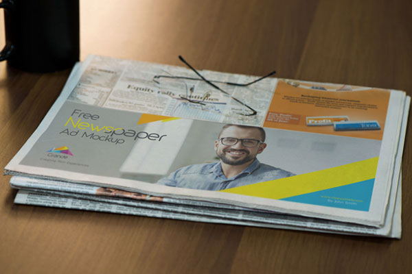 Half-Folded Newspaper Mockup in Perspective FREE PSD