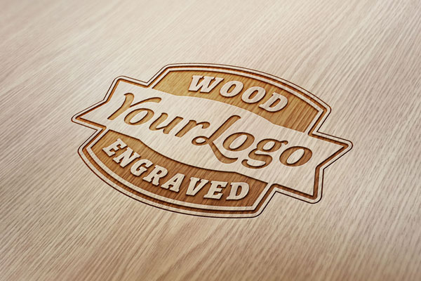 Logo Engraved On Wooden Surface Mockup FREE PSD