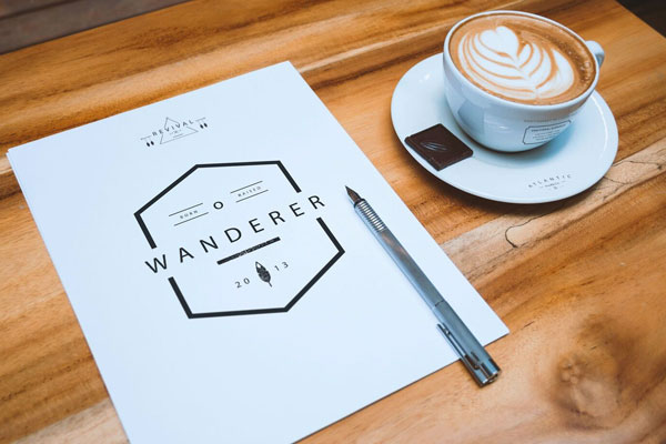 Mockup Displaying Perspective View of A4 Letterhead and Coffee Cup FREE PSD