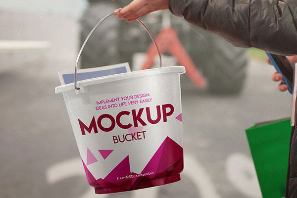 Mockup Featuring a Hand Holding a Bucket FREE PSD