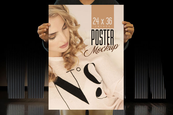 Mockup Featuring a Man Holding a Maxi Poster FREE PSD