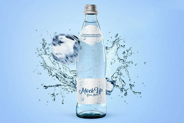 Mockup Featuring Glass Bottled Water, with Water Splash in the Background FREE PSD