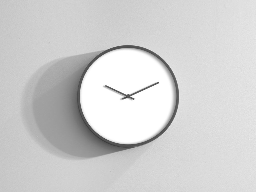 Mockup Featuring Round Clock on Wall FREE PSD