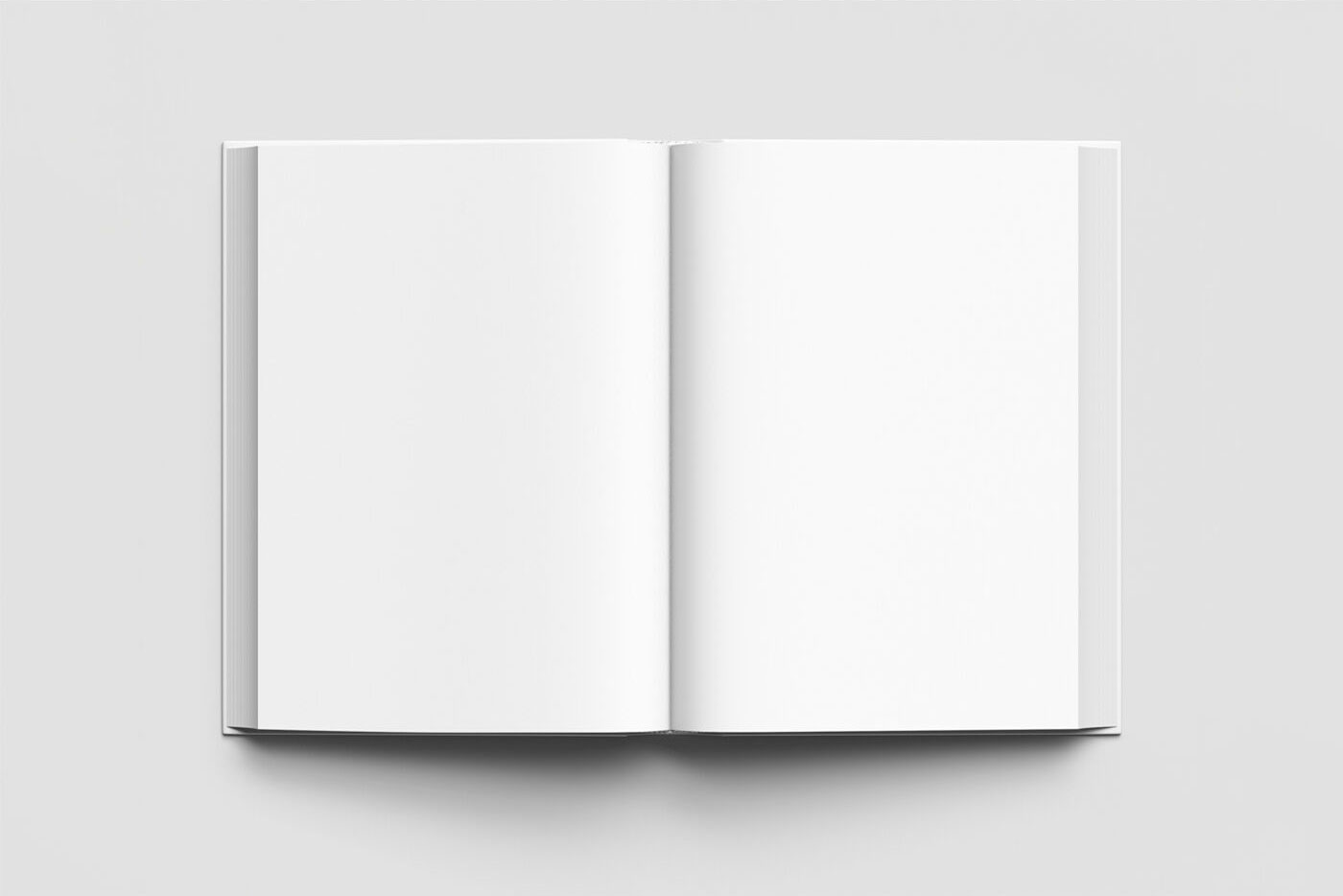 Mockup Featuring Top View of an Opened Book FREE PSD