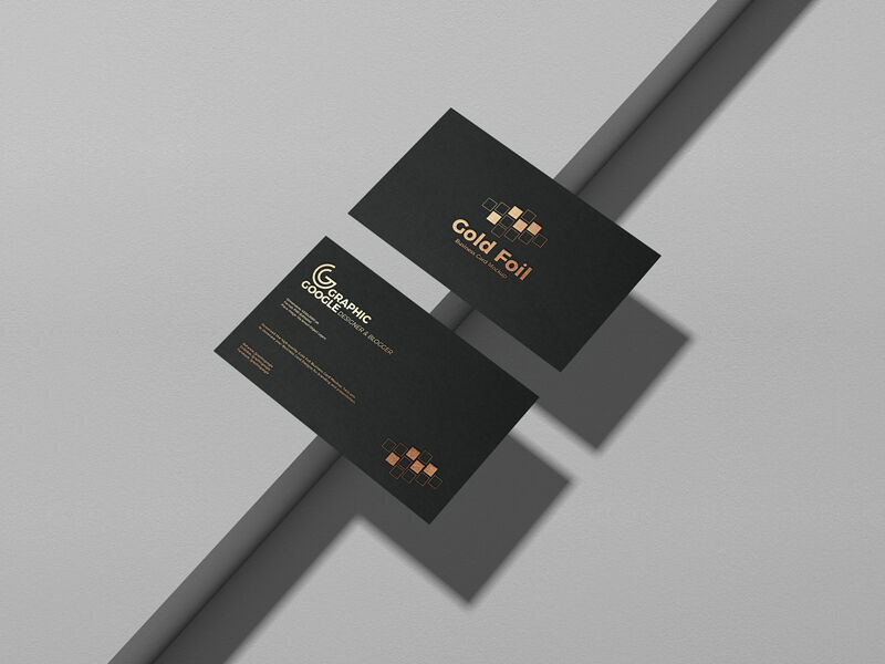 Mockup of Two Golden Foil Business Cards at the 3\4 Angle View FREE PSD