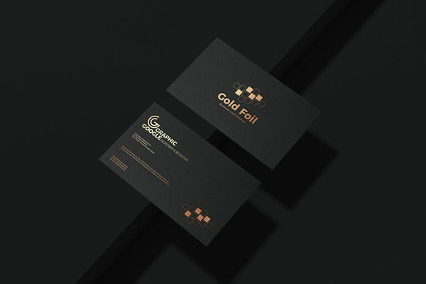 Mockup of Two Golden Foil Business Cards at the 3\4 Angle View FREE PSD
